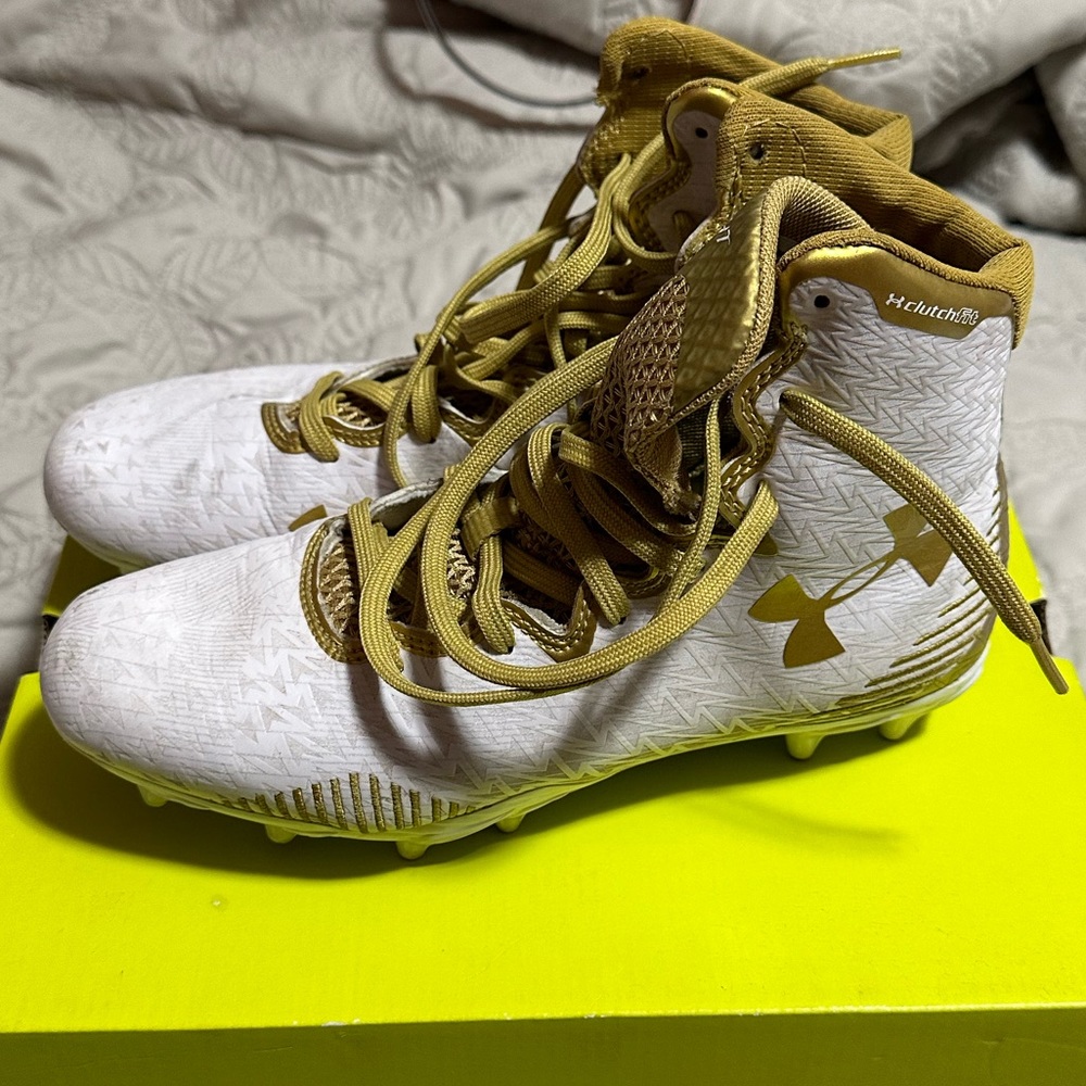 Lacrosse Cleats. White and gold Under Armour Women’s Lax Highlights.